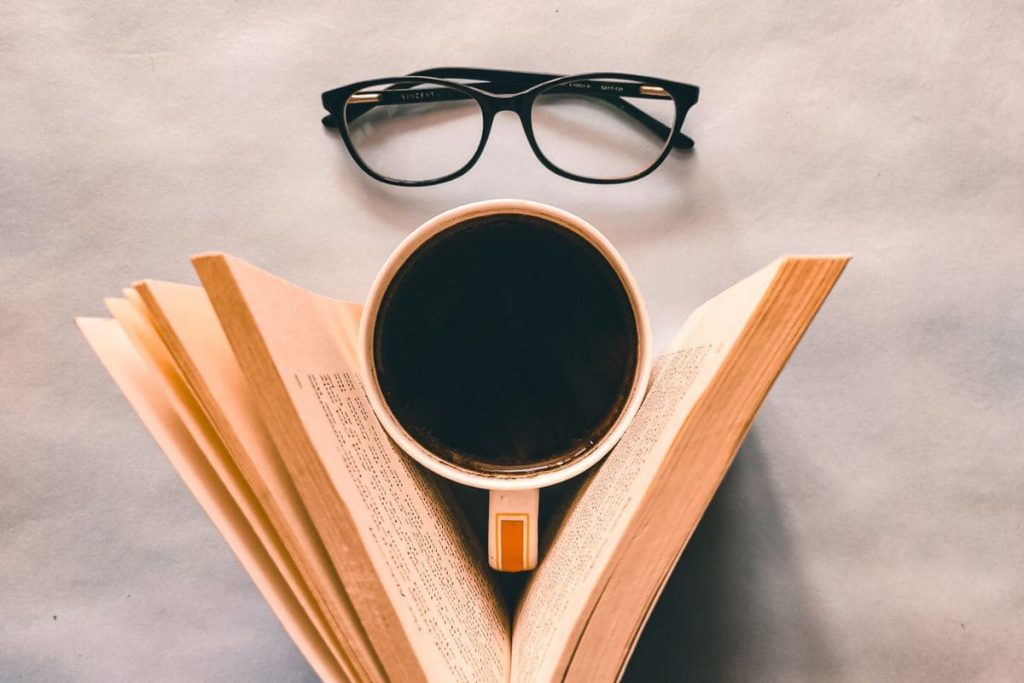 book, black coffee, black glasses