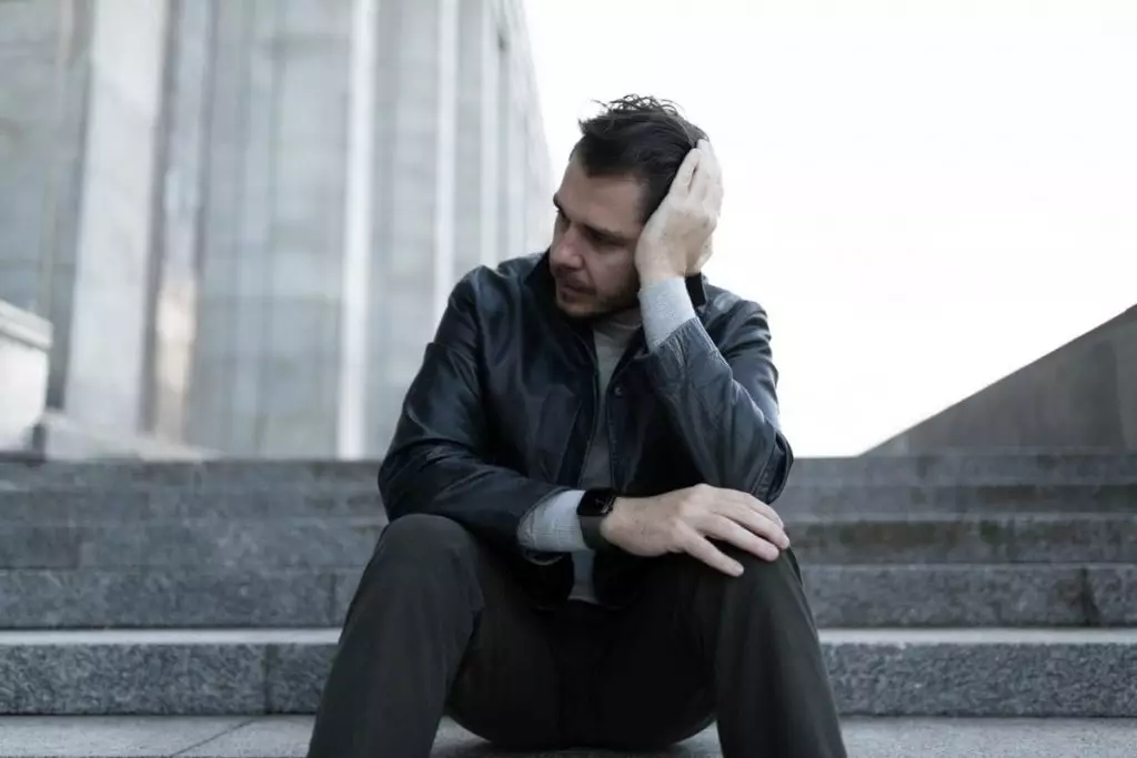 Portrait of a man experiencing tough thoughts and feelings