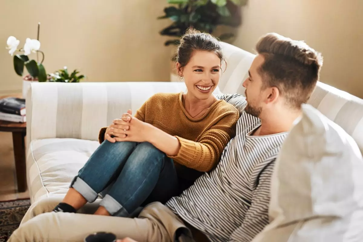 Communication is key to a good relationship, couple sitting on a couch