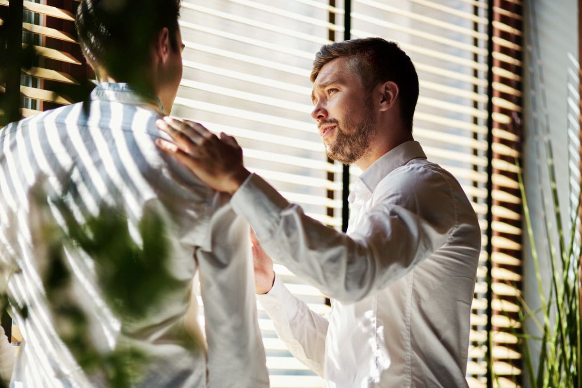 Friendly businessman talking in office