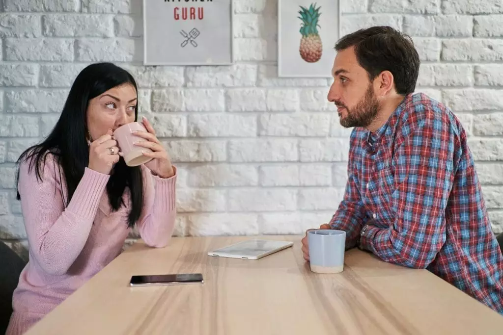 Couple talking, man and woman, morning chit chat